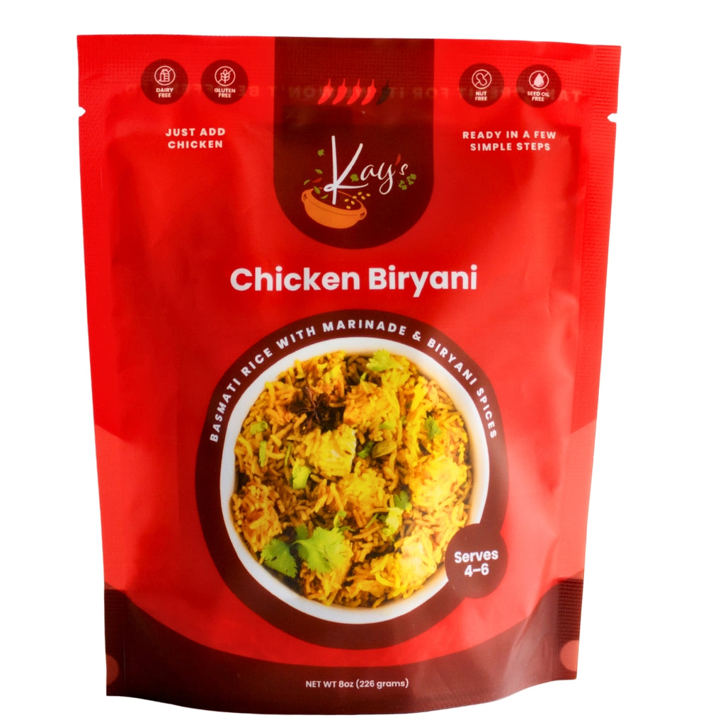 Red package of Kay's Curries Chicken Biryani on a white background