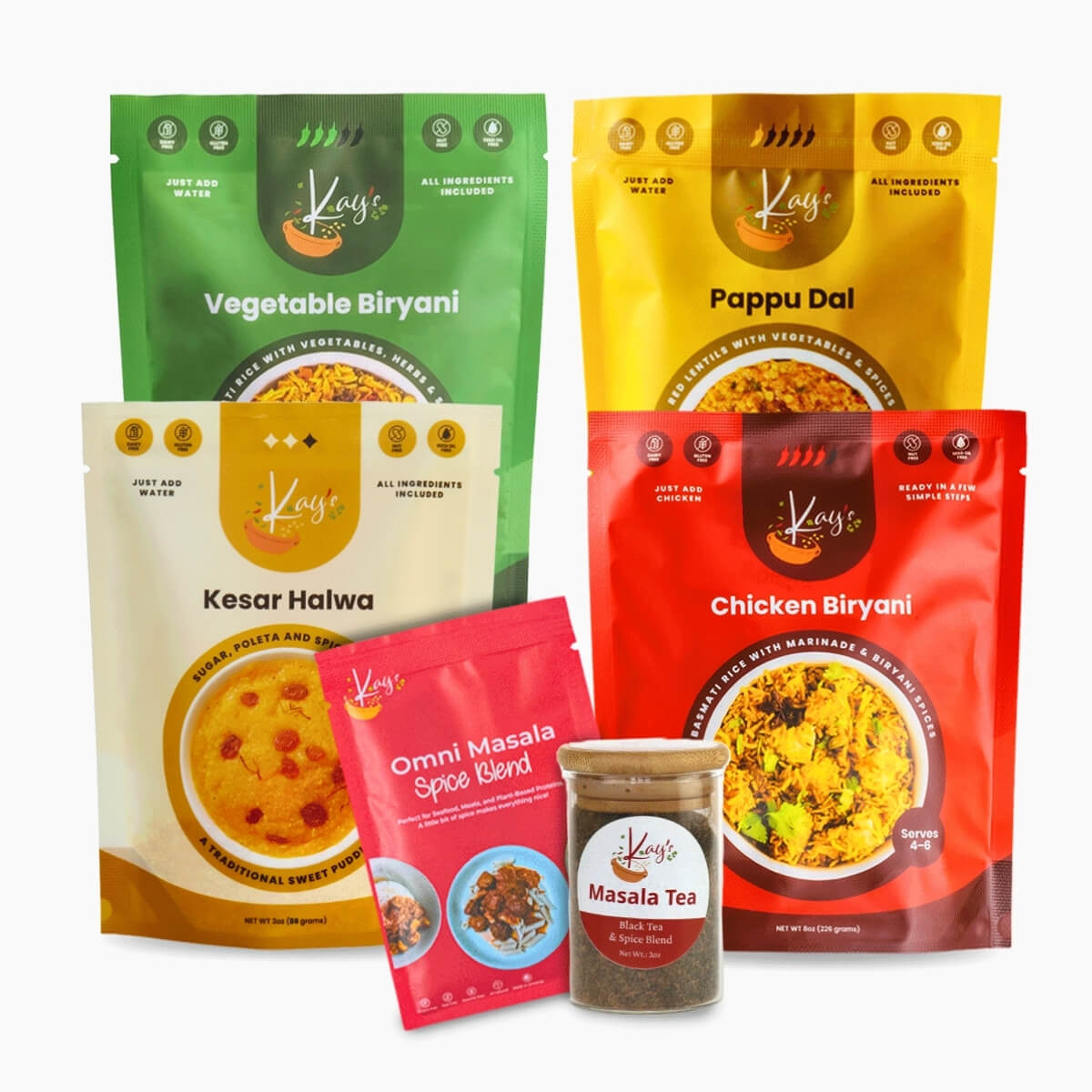 Kay’s Curries Biryani Lover box with Chicken Biryani, Vegetable Biryani, Pappu Dal, Kesar Halwa, Omni-Masala and Masala Tea
