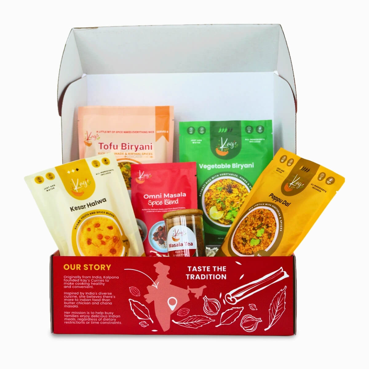 Kay’s Curries Biryani Lover in a red gift box with Tofu Biryani, Vegetable Biryani, Pappu Dal, Kesar Halwa, Omni-Masala and Masala Tea