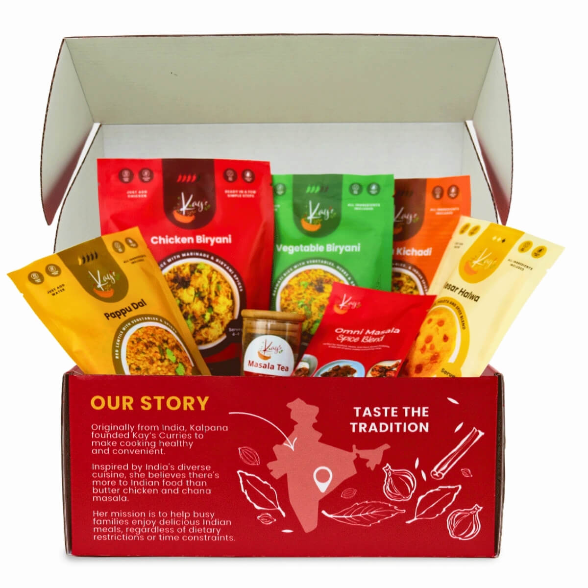 Kay's Curries Complete Collection in a red gift box with Chicken Biryani, Vegetable Biryani, Masala Kichadi, Pappu Dal, Kesar Halwa, Omni-Masala and Masala Tea
