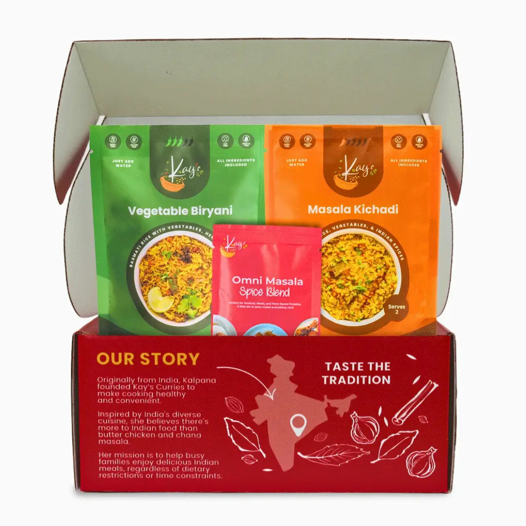 Kay’s Curries Weeknight Duo in a red gift box with Vegetable Biryani, Masala Kichadi and Omni-Masala